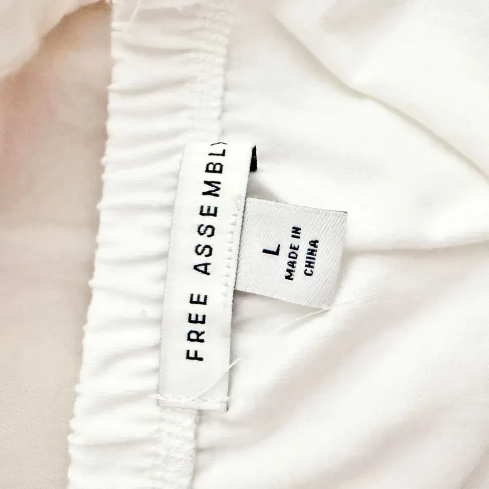 FREE ASSEMBLY | NWT Free Ruffle Shirred Flounce Tank White Cross Back | Large - Picture 8 of 8